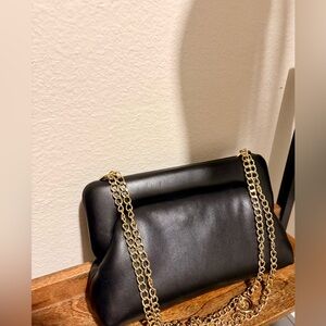 Elegant Black Leather Bag with Gold Chain